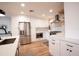 Modern kitchen with white cabinets, stainless steel appliances & quartz countertops at 4525 N 82Nd St, Scottsdale, AZ 85251