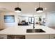 Bright kitchen with island, stainless steel appliances, and white cabinets at 4525 N 82Nd St, Scottsdale, AZ 85251