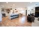 Open concept kitchen with white cabinets and large island at 4525 N 82Nd St, Scottsdale, AZ 85251