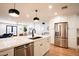 Modern kitchen featuring stainless steel appliances and white cabinetry at 4525 N 82Nd St, Scottsdale, AZ 85251