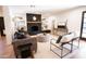 Living room with fireplace, and hardwood floors at 4525 N 82Nd St, Scottsdale, AZ 85251