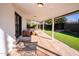 Relaxing covered patio with brick flooring and outdoor seating at 4525 N 82Nd St, Scottsdale, AZ 85251