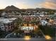 Aerial view showing community pool and surrounding buildings at 4805 N Woodmere Fairway Ln # 1012, Scottsdale, AZ 85251