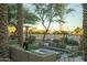 Relaxing patio with seating area and fire pit, perfect for outdoor entertaining at 4805 N Woodmere Fairway Ln # 1012, Scottsdale, AZ 85251