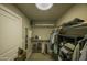 Spacious walk-in closet with ample shelving and hanging space at 4805 N Woodmere Fairway Ln # 1012, Scottsdale, AZ 85251