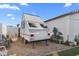 Backyard with a camper and sand at 500 W Jasper Dr, Chandler, AZ 85225