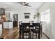 Bright dining area with a square wooden table and six chairs at 500 W Jasper Dr, Chandler, AZ 85225