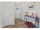 Bright and airy entryway with wood flooring and console table at 500 W Jasper Dr, Chandler, AZ 85225