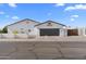 White single story home with a large garage and basketball hoop at 500 W Jasper Dr, Chandler, AZ 85225