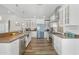 Modern kitchen featuring stainless steel appliances and wood-look flooring at 500 W Jasper Dr, Chandler, AZ 85225