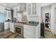 Bright kitchen with stainless steel range and white shaker cabinets at 500 W Jasper Dr, Chandler, AZ 85225