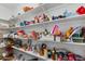 Well-stocked pantry with ample shelving for food storage at 500 W Jasper Dr, Chandler, AZ 85225