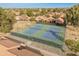 Two tennis courts with surrounding landscaping at 5025 E Waltann Ln, Scottsdale, AZ 85254