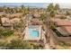 Community pool and spa with surrounding patio furniture at 5025 E Waltann Ln, Scottsdale, AZ 85254