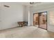 Bedroom with sliding door to patio access and carpeted floor at 5025 E Waltann Ln, Scottsdale, AZ 85254