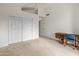 Bright bedroom with double door closet and carpeted floor at 5025 E Waltann Ln, Scottsdale, AZ 85254