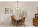 Dining room with a wood table and six chairs at 5025 E Waltann Ln, Scottsdale, AZ 85254