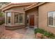 Front entry with a brown door and brick walkway at 5025 E Waltann Ln, Scottsdale, AZ 85254