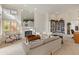 Living room with fireplace, high ceilings and lots of natural light at 5025 E Waltann Ln, Scottsdale, AZ 85254