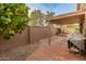 Brick patio with covered area and grill at 5025 E Waltann Ln, Scottsdale, AZ 85254