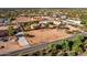 Aerial view of a house with a large backyard, in a desert setting at 5271 E Shiprock St, Apache Junction, AZ 85119