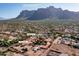 Aerial view showing home, pool, barn, and 3-car garage at 5271 E Shiprock St, Apache Junction, AZ 85119