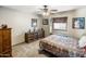 Cozy bedroom with wood dresser and window seat at 5271 E Shiprock St, Apache Junction, AZ 85119