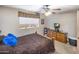 Bright bedroom with a double bed and wood dresser at 5271 E Shiprock St, Apache Junction, AZ 85119