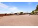 Horse corral with barn in background at 5271 E Shiprock St, Apache Junction, AZ 85119