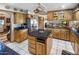 Island kitchen with granite countertops and stainless steel appliances at 5271 E Shiprock St, Apache Junction, AZ 85119