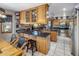 Large kitchen featuring a sizable island and extensive wood cabinetry at 5271 E Shiprock St, Apache Junction, AZ 85119