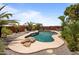 Relaxing kidney shaped pool with flagstone decking at 5271 E Shiprock St, Apache Junction, AZ 85119