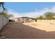 Large backyard with gravel and block wall at 5715 W Heatherbrae Dr, Phoenix, AZ 85031