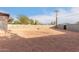 Large backyard with gravel and block wall at 5715 W Heatherbrae Dr, Phoenix, AZ 85031