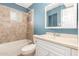 Bathroom with a white vanity, tiled shower and neutral walls at 5715 W Heatherbrae Dr, Phoenix, AZ 85031