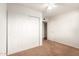 Bedroom with neutral walls, carpet and a ceiling fan at 5715 W Heatherbrae Dr, Phoenix, AZ 85031