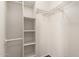 White closet with shelves and hanging rod at 5715 W Heatherbrae Dr, Phoenix, AZ 85031