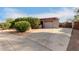 House exterior with driveway and landscaping at 5715 W Heatherbrae Dr, Phoenix, AZ 85031