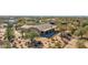 Aerial view of house with covered patio, desert landscaping, and mountain backdrop at 5950 E Lowden Ct, Cave Creek, AZ 85331