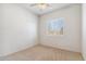 Bright bedroom with window shutters and ceiling fan at 5950 E Lowden Ct, Cave Creek, AZ 85331