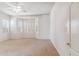 Bright bedroom featuring a large bay window with shutters at 5950 E Lowden Ct, Cave Creek, AZ 85331