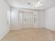 Bedroom with bay window, plantation shutters, and neutral carpet at 5950 E Lowden Ct, Cave Creek, AZ 85331