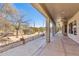 Extended covered patio, overlooking desert landscape at 5950 E Lowden Ct, Cave Creek, AZ 85331