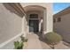 Elegant entryway with double doors and pathway at 6406 E Helm Dr, Scottsdale, AZ 85254