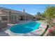 Inviting freeform swimming pool in a well-maintained backyard setting at 6406 E Helm Dr, Scottsdale, AZ 85254