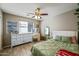 Bedroom with a queen bed, dresser, and desk at 731 N Nantucket St, Chandler, AZ 85225