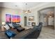 Living room with sectional sofa, fireplace and art at 731 N Nantucket St, Chandler, AZ 85225