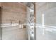 Modern shower with multiple shower heads and stylish tile at 731 N Nantucket St, Chandler, AZ 85225