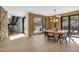 Modern dining room with round table and mountain views at 8200 N Charles Dr, Paradise Valley, AZ 85253