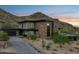 Luxury home exterior with landscaping and mountain views at 8200 N Charles Dr, Paradise Valley, AZ 85253